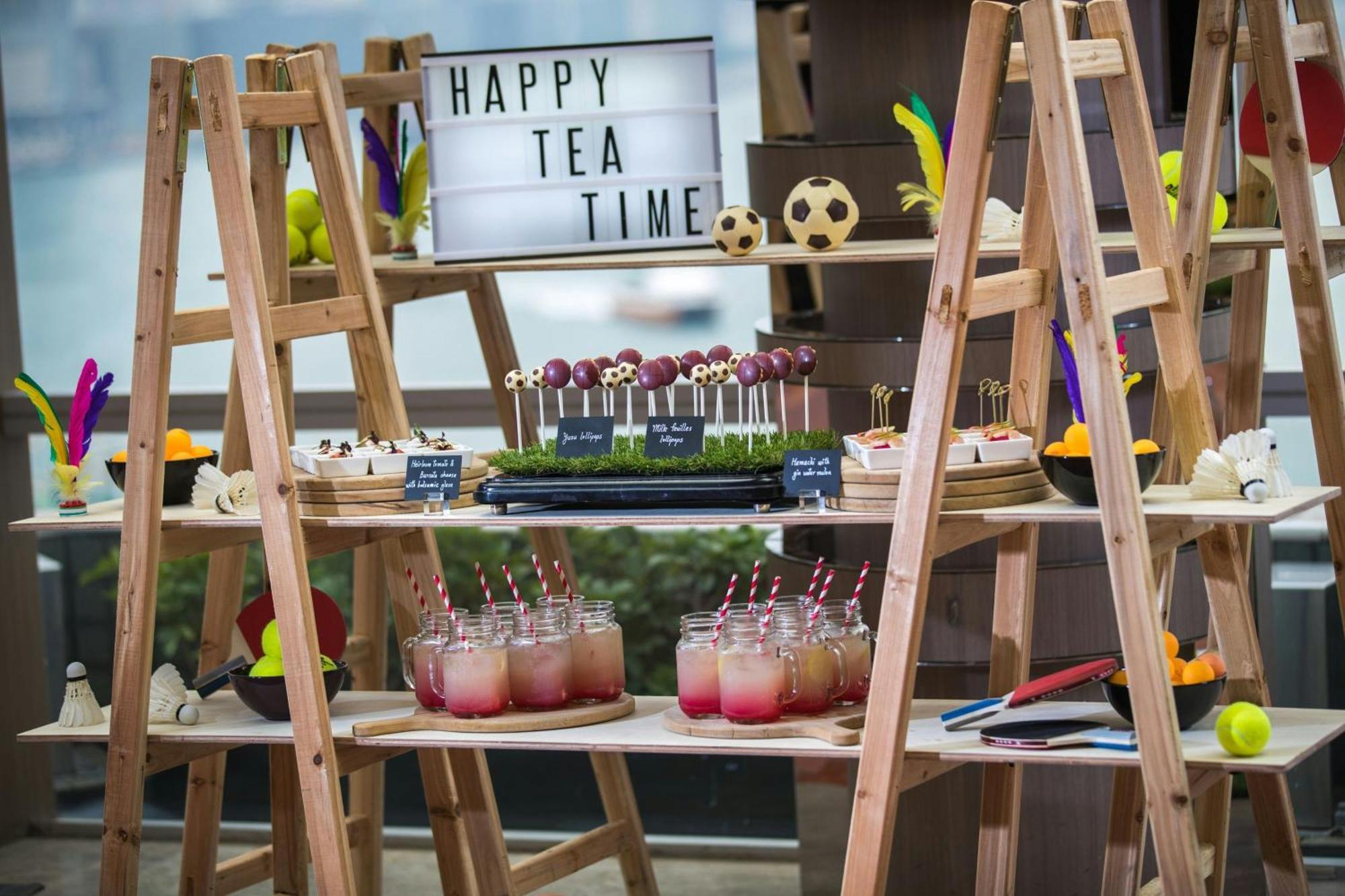 Renaissance Hong Kong Harbour View Hotel Exterior photo A tea time display at the 2019 Wimbledon Championships
